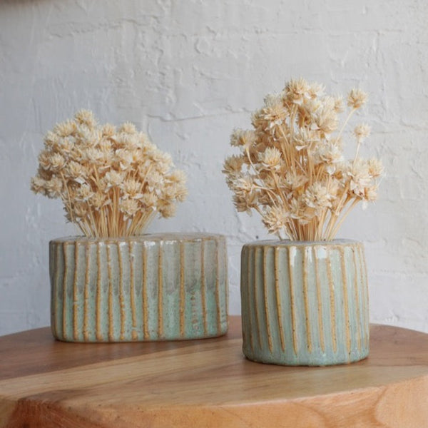 Palm Bud Vases with Dried Flowers