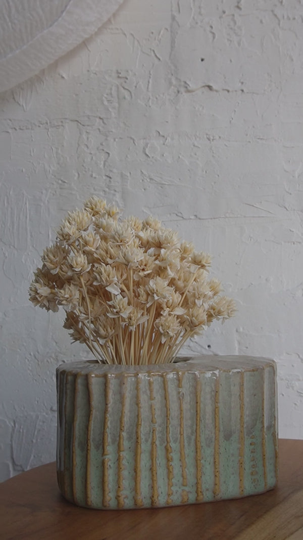 Palm Bud Vases with Dried Flowers